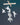 Decorative hanging mobile with white  pvc hummingbird shapes surrounding flower on a dark blue background