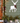 white pvc deer wall art shown on green house with holiday decor