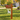 white pvc deer decorative bracket under a wood mailbox post in front of a house