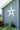 White starfish cutout made from pvc on a blue house
