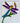 A colorful pvc dragonfly bracket for use on a mailbox or porch post, featuring purple wings, a blue and green body, a yellow head, and green leaves with a brown cattail.